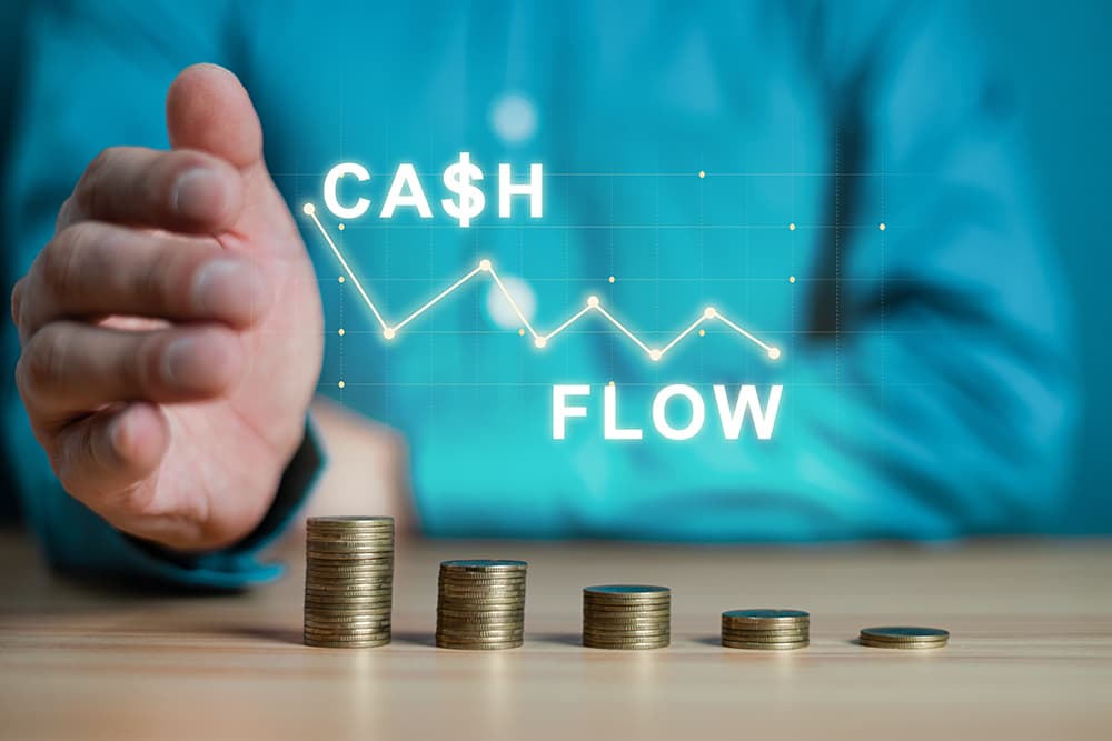 Man looking at coins for cash flow and rolling reserves
